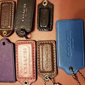A variety of Coach Hang Tags